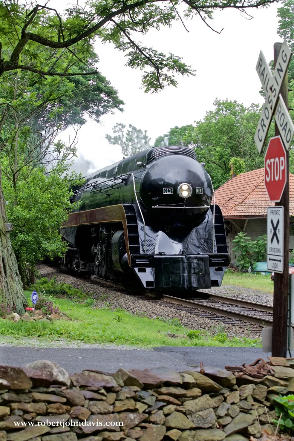 N&W #611 breaks the quiet of a Sunday morning in northern Virginia. - Photo by Robert John Davis