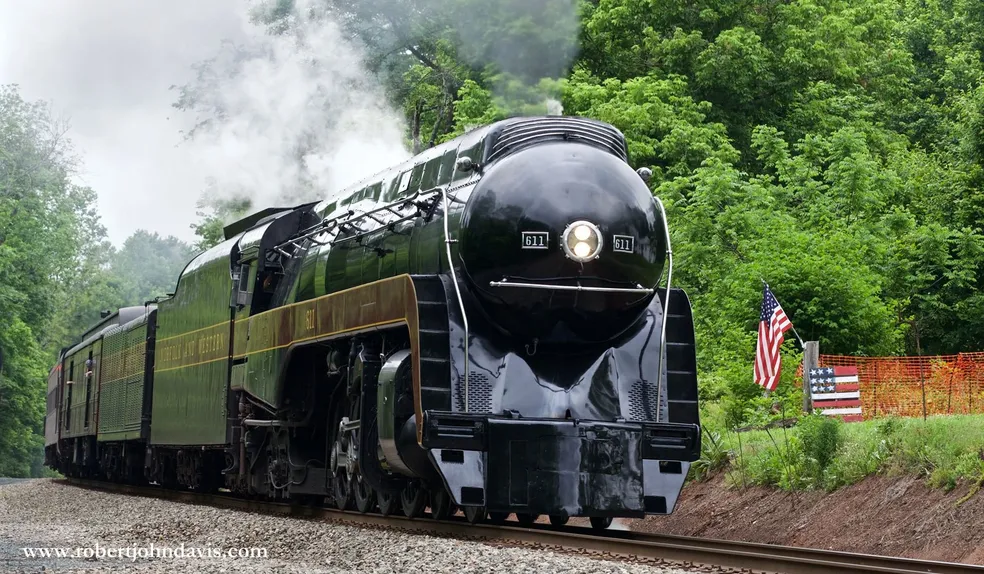 N&W #611 breaks the quiet of a Sunday morning in northern Virginia. - Photo by Robert John Davis